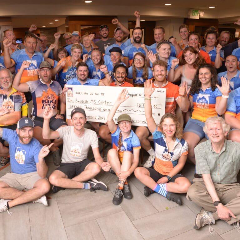 Team celebrating fund raised by Bike the US for MS