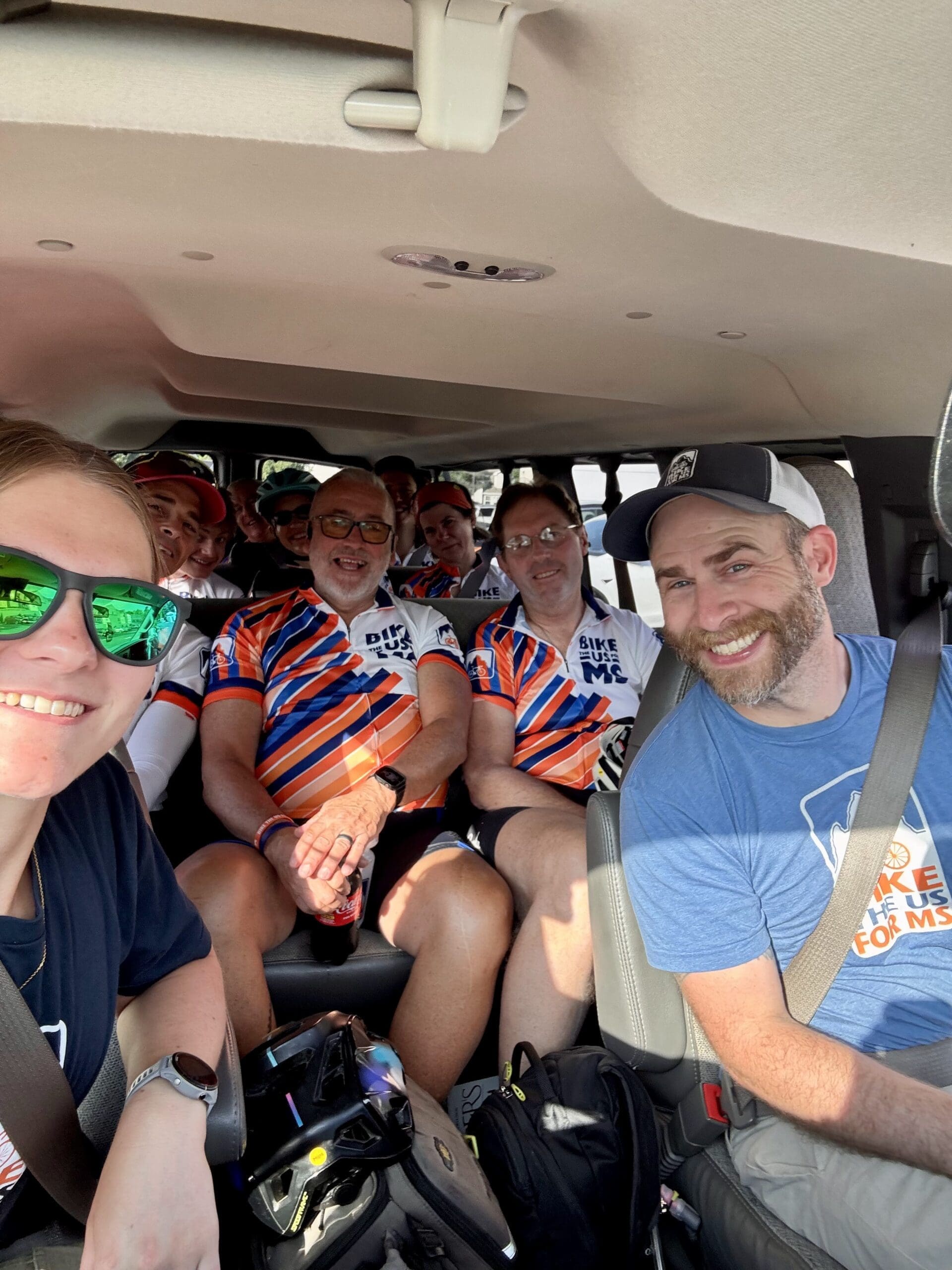 Bike the US for MS riders in the support van being ferried away from smoke 